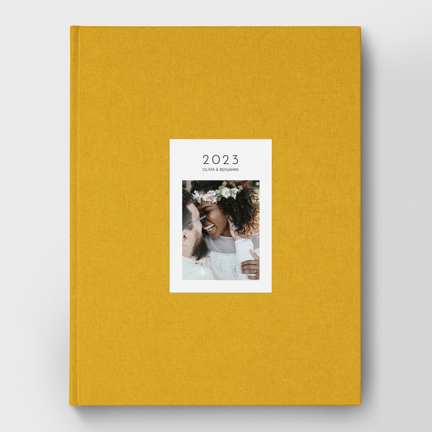 Livre photo couverture tissu photo embossée