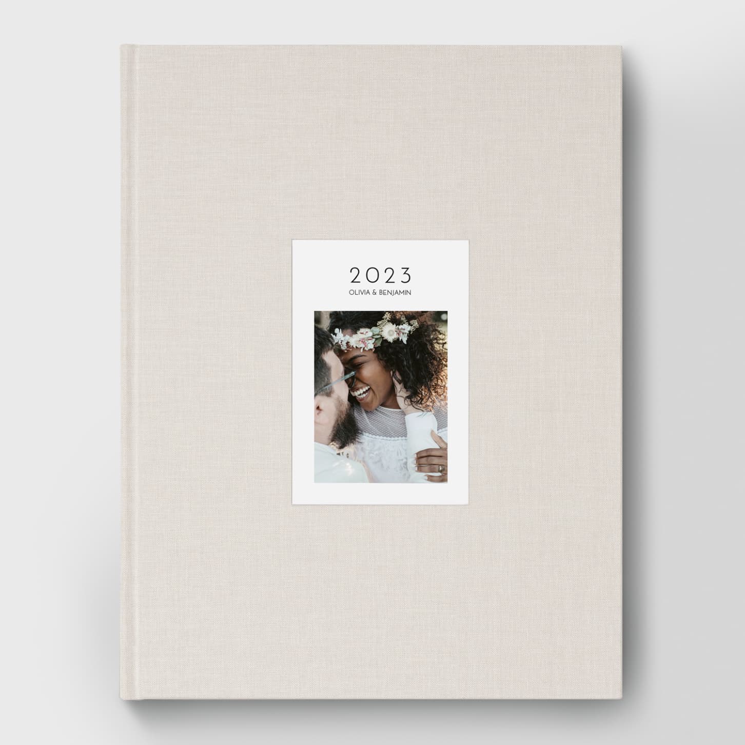 L'album tissu à la couverture embossée